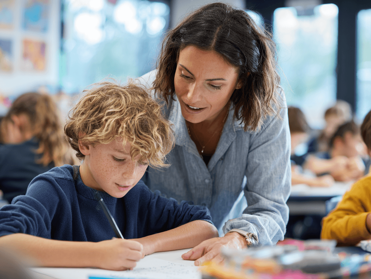 Teacher guiding students through an enrichment activity