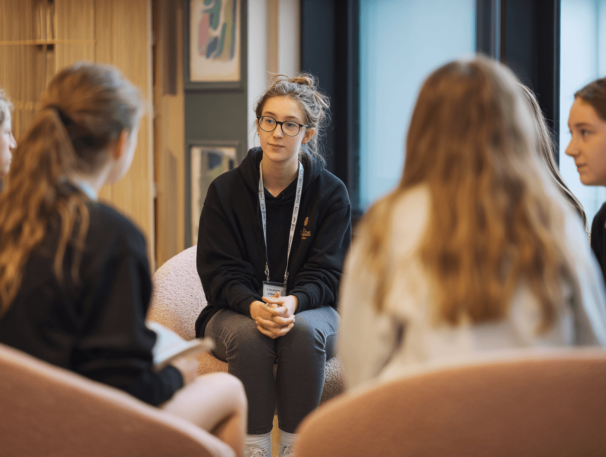 Teacher taking students through a wellbeing reflection activity